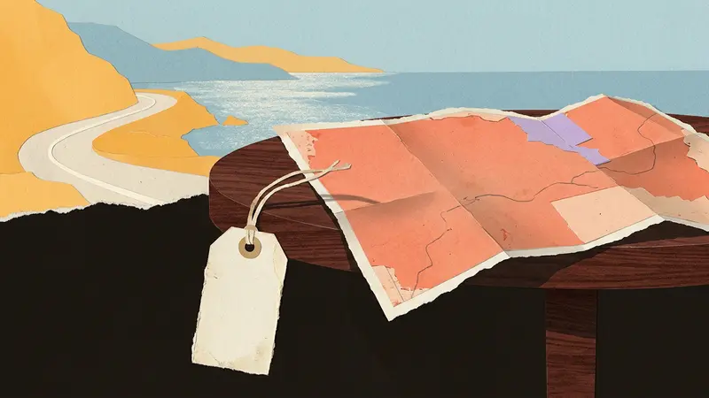 A luggage tag and a folded paper map resting on a wooden table with a blurred horizon in the background.