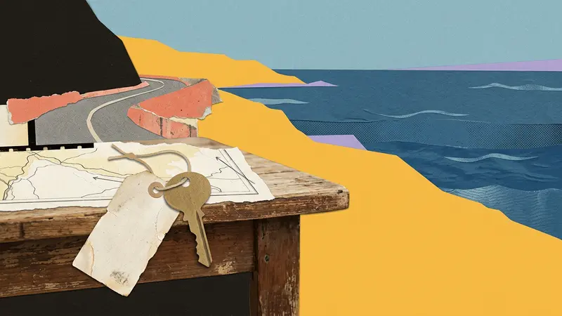 Papercraft scene with a blank luggage tag, a brass key, and a distant view of a coastal road.