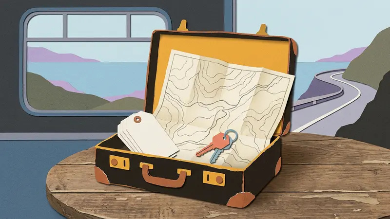 A suitcase containing blank luggage tags, a brass room key, and a folded paper map on a café table.
